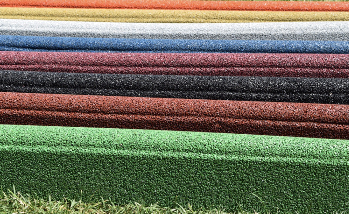 Instalación de Caucho insitu con solerillas de caucho